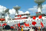 ID 2301 YUAN WANG 2 (1979/21000 tonnes displacement) - Flag-waving members of the local Chinese community welcomes the Chinese space-tracking ship on her arrival in Auckland, New Zealand.